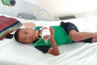 Eusebius E Prima, Bocah Penderita Tumor Ganas Saat ini Sedang Butuh Bantuan Untuk Rujuk ke Bali. (Foto: Apong)